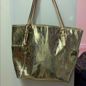 Gold Michael Kors purse